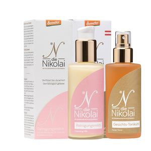 dieNikolai Reinigungsmilch und Gesichts-Tonikum mit weisser und goldener Faltschachtel – Demeter Bio-Naturkosmetik Reinigungs-Duo aus der Wachau