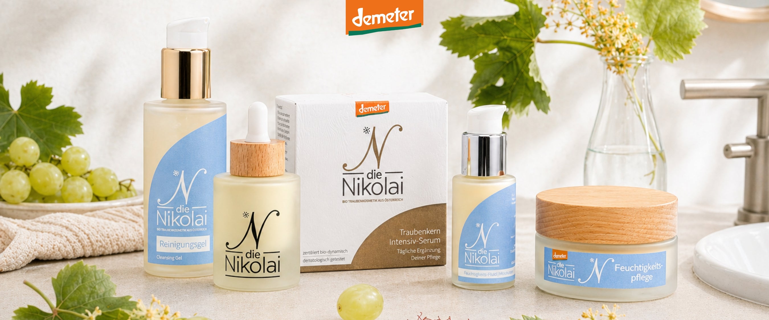 Produktgruppe dieNikolai Reinigungsgel, Intensiv-Serum und Feuchtigkeitspflege mit Demeter-Karton, Weinblättern und Trauben – Bio-Traubenkosmetik aus der Wachau