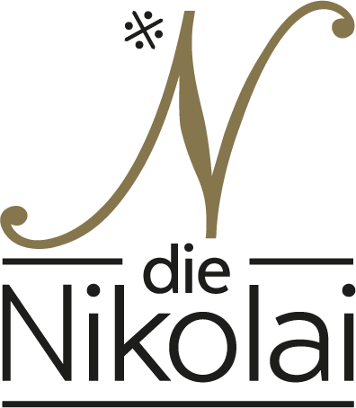 Logo dieNikolai mit kalligrafischem N-Schriftzug und Asterisk-Symbol – Markenzeichen der Demeter Bio-Traubenkosmetik aus der Wachau